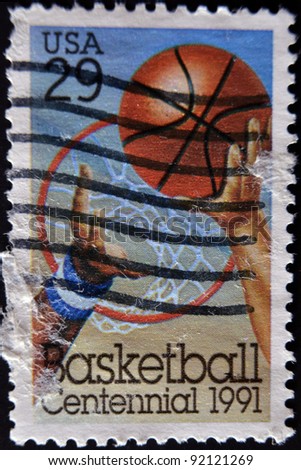 UNITED STATES - CIRCA 1991: stamp printed in USA shows Basketball, Hoop, Players Arms, circa 1991