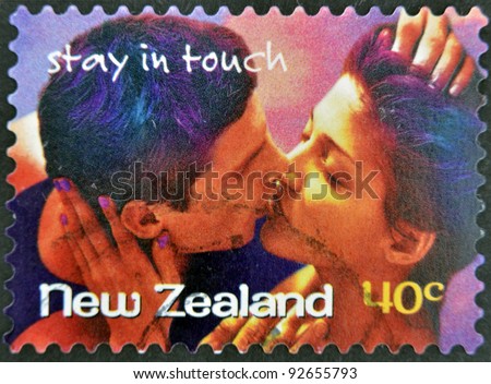 NEW ZEALAND- CIRCA 1998: A stamp printed in New Zealand shows couple kissing, stay in touch, circa 1998