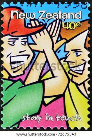 NEW ZEALAND- CIRCA 1998: A stamp printed in New Zealand shows two friends greet, stay in touch, circa 1998