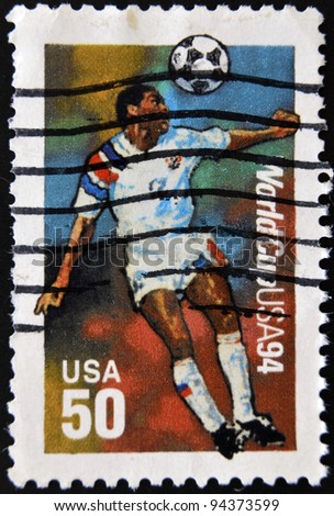 USA - CIRCA 1994:A post stamp printed in USA shows football player, devoted football world championship,USA, circa 1994.