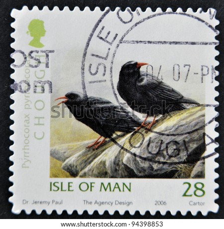 ISLE OF MAN - CIRCA 2006: A stamp printed in Isle of Man shows chough, Pyrrhocorax, circa 2006