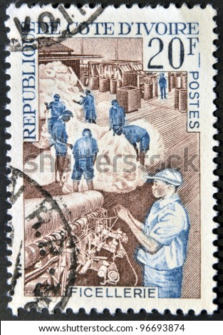 IVORY COAST - CIRCA 1960: A stamp printed in Ivory Coast shows thread industry, circa 1960