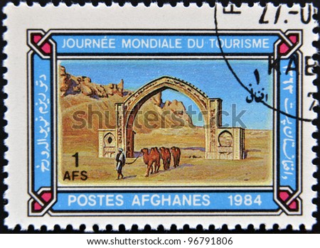 AFGHANISTAN - CIRCA 1984: A stamp printed in  Afghanistan devoted to World Tourism Day, shows Qalai Bist Arch, circa 1984