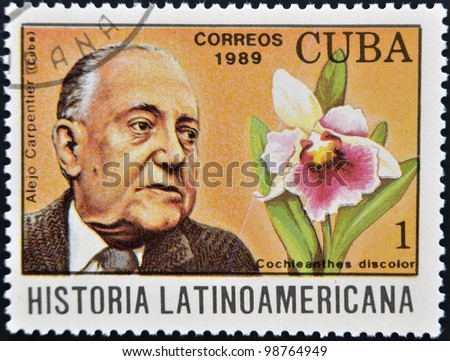 CUBA - CIRCA 1989: A stamp printed in CUBA dedicated to Latin American history, shows a Cochleanthes discolor and Alejo Carpentier, circa 1989