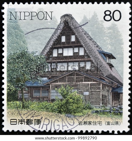 JAPAN - CIRCA 1997: A stamp printed in Japan shows traditional housing in Shirakawago, circa 1997