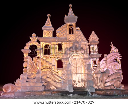 Beautiful winter ice sculpture of a frozen castle at the ice sculpture carving festival.