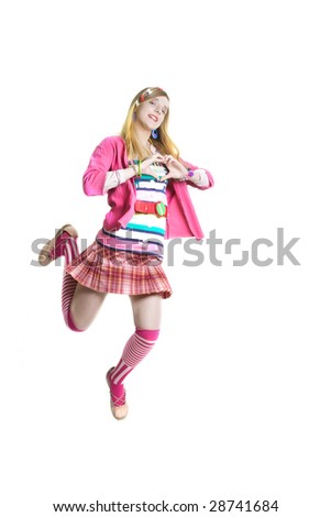Jumping teenager in pink mini skirt over white
