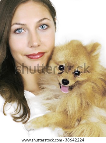 Beautiful model  and little adorable  spitzen dog