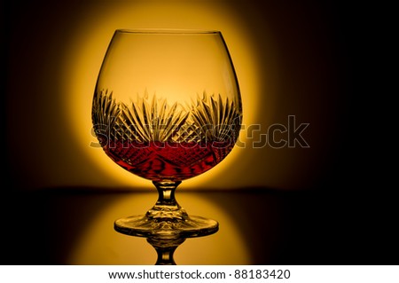 Brandy snifter backlit with low light