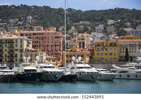 Luxury yachts in the port of Nice on the Cote d\'Azur on the French Riviera in the South of France.