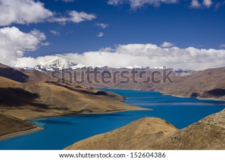 View from Yamdrok High Pass of the Turquoise Lake (16860ft) and the Tibetan Plateau in Tibet.
