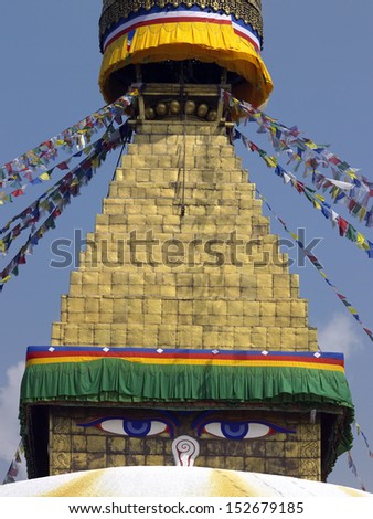 The all-seeing eyes of Buddha on the Boudhanath Stupa in Kathmandu in Nepal