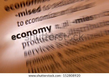 Economy - the wealth and resources of a country or region, especially in terms of the production and consumption of goods and services.