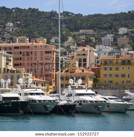 Luxury yachts in the port of Nice on the Cote d\'Azur on the French Riviera in the South of France.