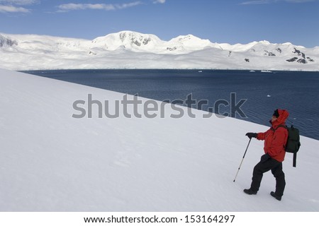 An adventure tourist on Nikko Island in Antarctica.