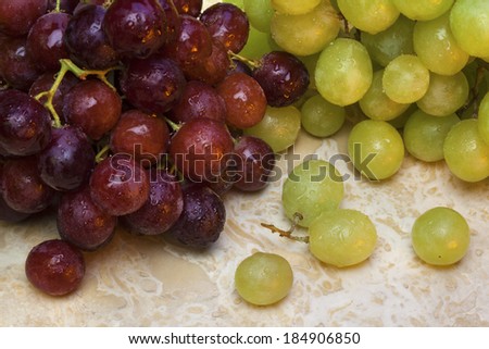 A grape is a fruiting berry of deciduous woody vines. Grapes can be eaten raw or they can be used for making wine, jam, juice, jelly, grape seed extract, raisins, vinegar, and grape seed oil.