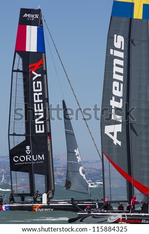 SAN FRANCISCO, CA - AUGUST 26: French team tries to overtake the Swedish team in front of the Alcatraz Island in the bay of San Francisco during the final of the America\'s Cup 2012. Aug 26 2012
