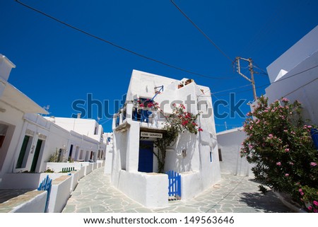 Typical traditional greek white and blue houses on the island of Folegandros. In most of the Cycladic islands, houses were painted white to reflect the harsh summer sun, Greece, 2013.