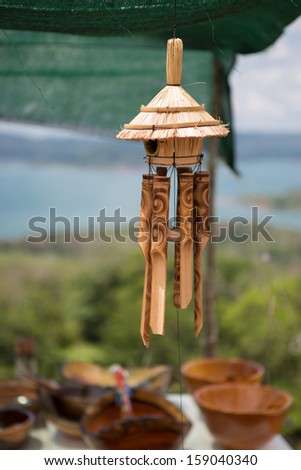 New wood wind bell instrument on a market in Costa Rica