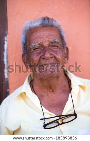 CARTAGENA, COLOMBIA, JANUARY 11 2014: Unidentified portrait of an old man looking at the camera in Cartagena, Colombia.