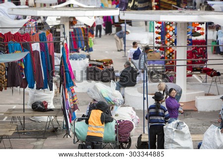 OTAVALO, ECUADOR, MARCH 1: Unidentified Ecuadorian people setting up the famous market in the morning. Mainly Mestizo ethnic group located in the north of Ecuador.2015