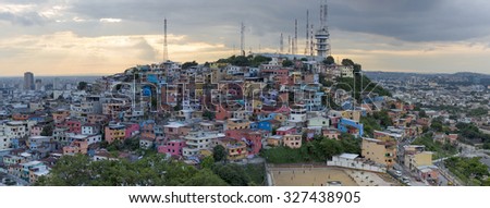 GUAYAQUIL, ECUADOR, FEB 18: Panoramic photo of Las Penas - the oldest area of Guayaquil city at sunset, South Ecuador 2015.