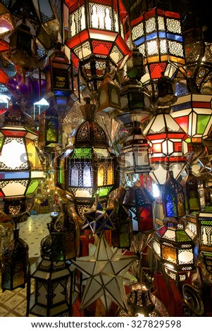 MARRAKESH, MOROCCO, SEPTEMBER 15: Group of colored lamps in a craft store in Marrakesh at night. Morocco 2006