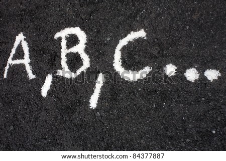 Letters ABC written on the floor in a school in Sicily