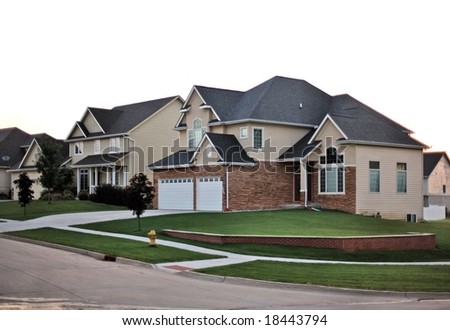Contemporary suburban neighborhood home on a corner lot subdivision