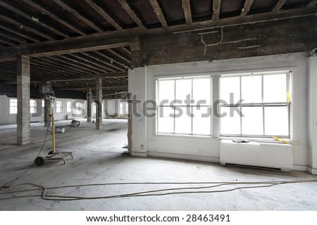 Interior remodeling work on an existing commercial building - preparing for energy efficient upgrades