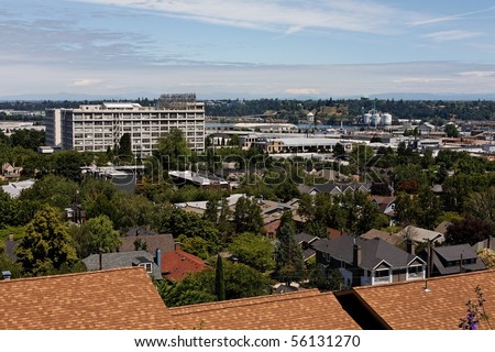 Industrial city scape, above the rooftops, an overview of the urban density, a dense mix of industrial and housing combinations in Portland, Oregon, USA