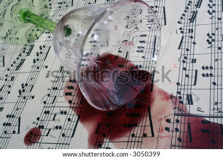 nostalgic red wine spill on music sheet