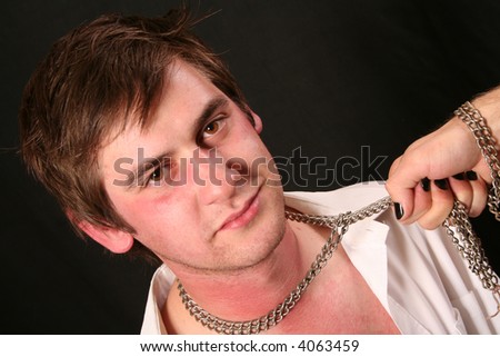 man with chain around his neck