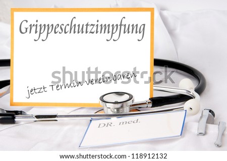 Shield with the german word Flu shot / Flu shot