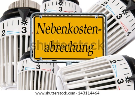 radiator thermostat with sign and the german words utility billing / utility billing