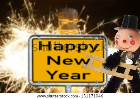 Chimney sweep with champagne bottle and sign with the words Happy New Year / new years eve