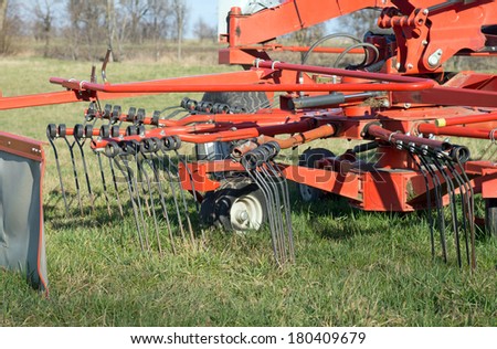 agricultural equipment on a field / agricultural equipment