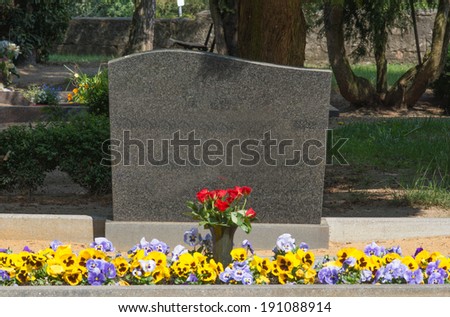 Grave stone with empty text box / cemetery