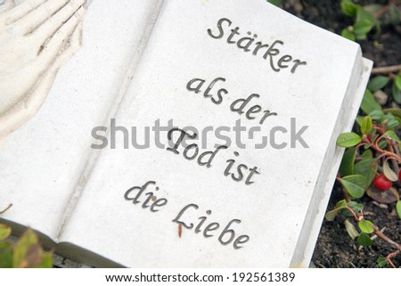Panel with german saying Stronger than death is love / Cemetery