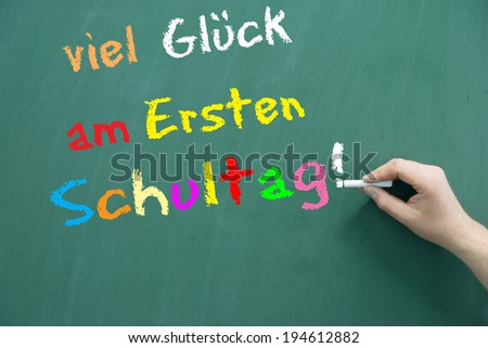 school blackboard with the german words good luck on the first day of school / starting school