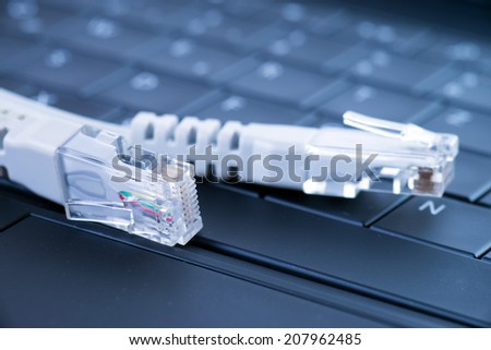 Computer keyboard with network cable / Network security