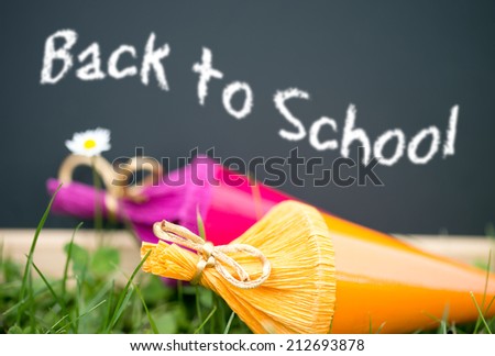 Sugar bags and chalkboard with the words Back to School / starting school