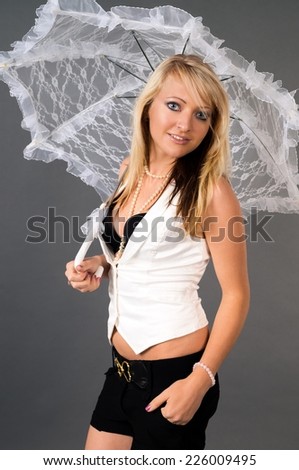 young woman with a umbrella in lace / Woman and umbrella