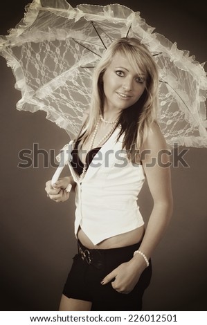 young woman with a umbrella in lace / Woman and umbrella
