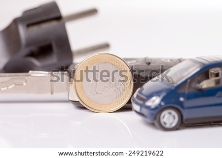 Power plug with euro money and car key / electric car