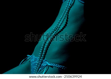 sexy woman in lingerie and pearl necklace / Woman