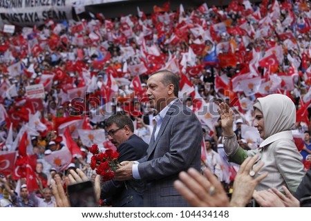 ISTANBUL,TURKEY-MAY 27,2012:The ruling AK Party's fourth ordinary congress was held on May 27,2012 in Istanbul,Turkey.Prime Minister Recep Tayyip Erdogan and his wife Emine Erdogan greet party members