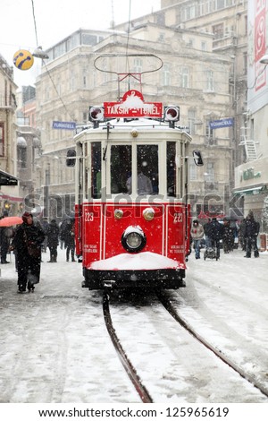 Istanbul,Turkey-January 8: Unidentified Pedestrians Walk Down Istiklal Street On A Snowy Day On January 8, 2013 In Istanbul, Turkey.Istiklal Street Is One Of The Popular Destinations In Istanbul.