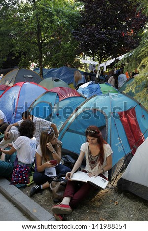 ISTANBUL,TURKEY-JUNE 8: Hundreds of people stay in Gezi Park  to avoid police intervention on June 08,2013 in Istanbul.