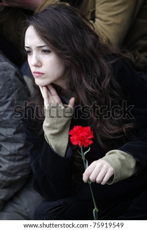 ISTANBUL - APRIL 24: Unidentified woman at ceremony of commemoration.The activists gathered together in Taksim Square to mark the anniversary of the Armenian Genocide, on April 24, 2011, Istanbul, Turkey
